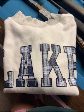 White Crewneck Sweatshirt with Navy Plaid Letters